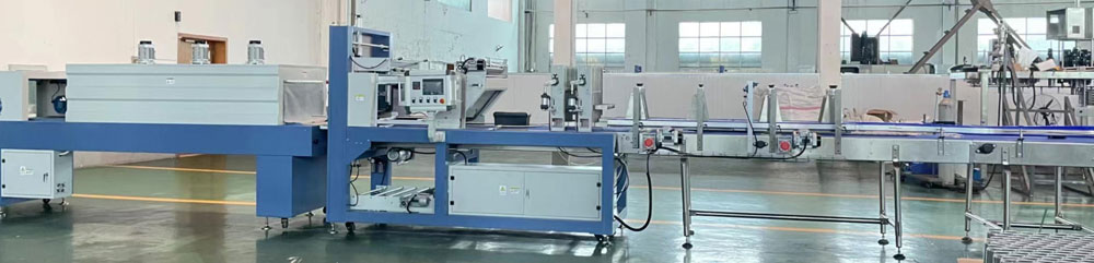 Large linear heat shrink packaging machine