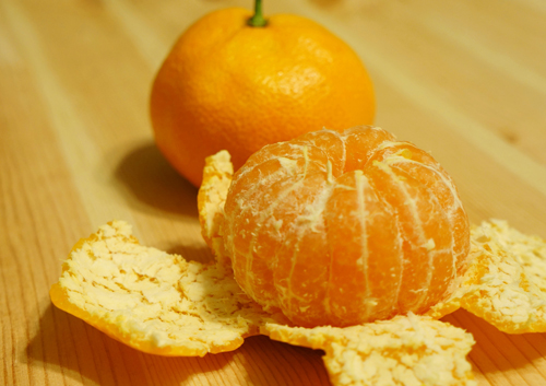 white fibers on oranges